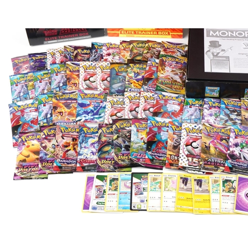 1149 - A large collection of Pokémon trade cards and a Monopoly board game, including Paradox Rift, Astral ... 