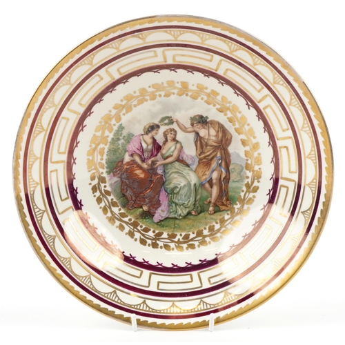 215 - A Royal Copenhagen Danish porcelain bowl decorated with Neo-classical figures, 30cm in diameter.