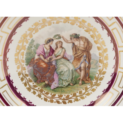 215 - A Royal Copenhagen Danish porcelain bowl decorated with Neo-classical figures, 30cm in diameter.