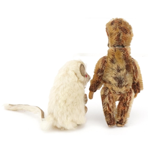 1087 - A miniature articulated monkey, possibly Schuco, together with a similar mouse, the largest 8cm high... 