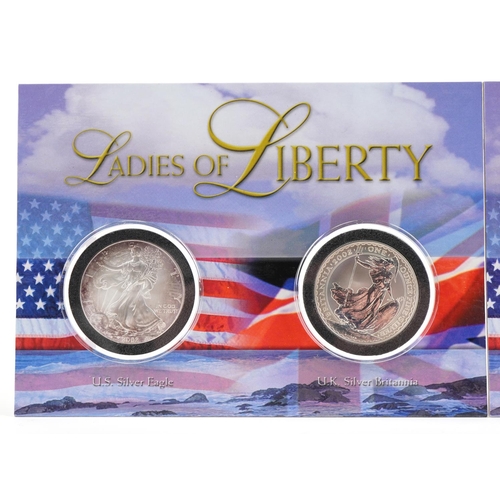 1299 - Two 2002 Ladies of Liberty US and UK silver dollar sets comprising two one ounce fine silver eagles ... 