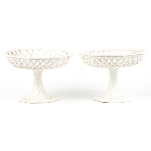 267 - A pair of 19th century Leeds creamware pierced tazzas, 16cm high x 24cm wide.