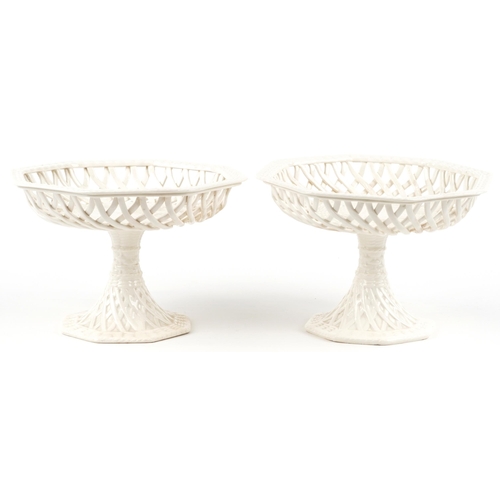 267 - A pair of 19th century Leeds creamware pierced tazzas, 16cm high x 24cm wide.