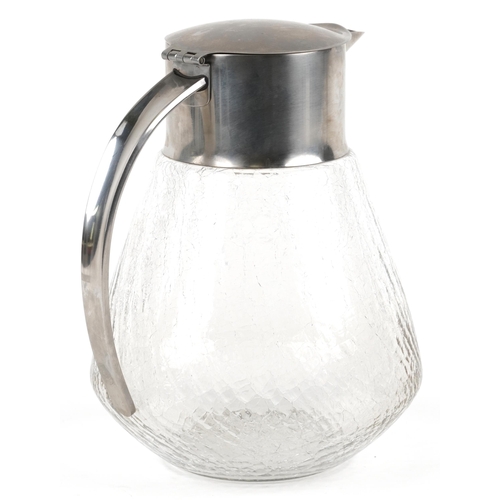 1617 - A Dresser style stainless steel and crackle design glass jug, 25cm high.