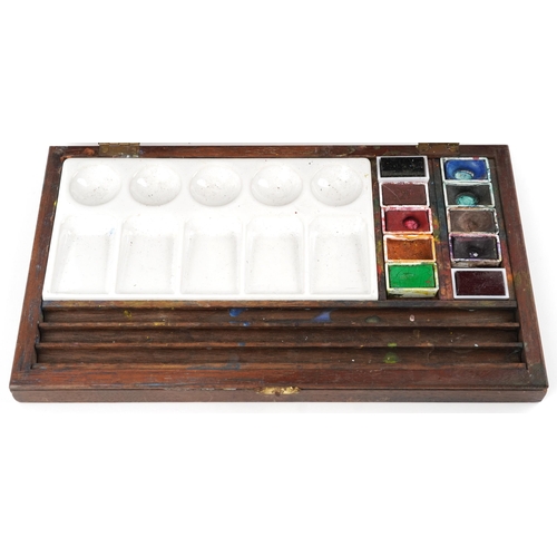 1641 - A 20th century artist's box with palette and paints, bearing an L. Cornelissen & Son label to the in... 