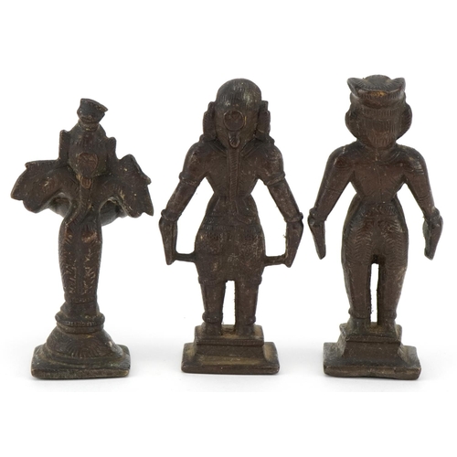 411 - Three 20th century Indian cast bronze statues of deities, the largest 11cm high.