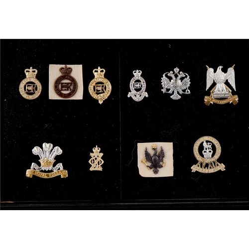 1490 - A collection of military interest cap badges including Royal Hussars, Waterloo Royal Scots Dragoon G... 