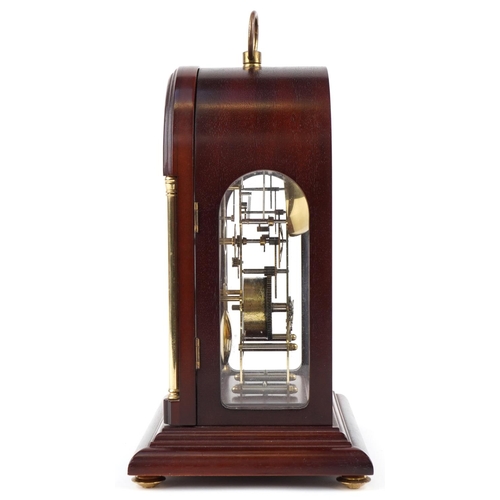 17 - A Hermle mahogany cased dome top mantle clock with visible movement, model 791-081, 32cm high.