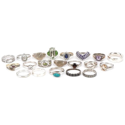 3716 - Twenty silver and white metal rings, some set with semi precious stones, various sizes, total weight... 