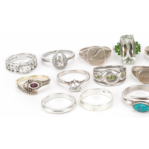 3716 - Twenty silver and white metal rings, some set with semi precious stones, various sizes, total weight... 