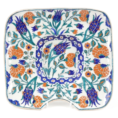 382 - A Turkish Ottoman Iznik barber's bowl, hand painted with flowers, 31cm x 28.5cm