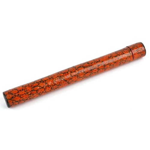 393 - A Turkish Islamic papier mâché pen case decorated with stylized motifs, 32cm in length.