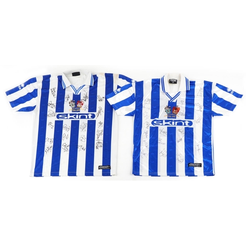 1411 - Two signed Brighton & Hove Albion 2000-2021 home football shirts, one XL, the other S.