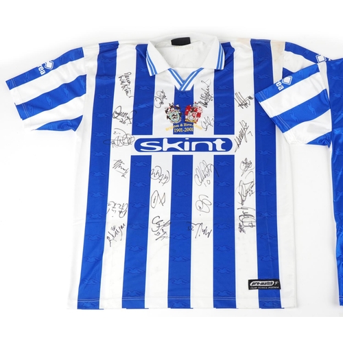 1411 - Two signed Brighton & Hove Albion 2000-2021 home football shirts, one XL, the other S.