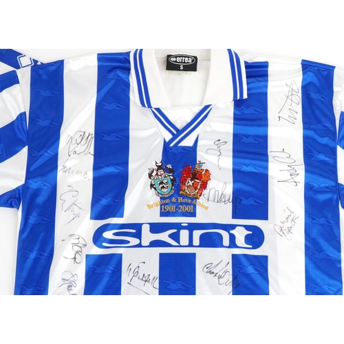 1411 - Two signed Brighton & Hove Albion 2000-2021 home football shirts, one XL, the other S.