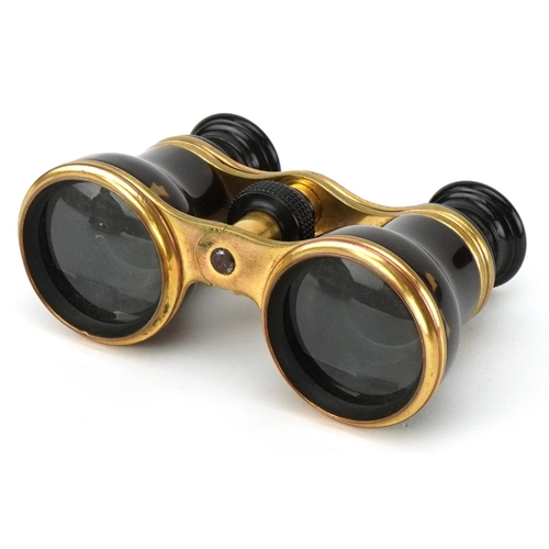 26 - A pair of 20th century gilt brass and tortoiseshell opera glasses by Dollond of London, housed in a ... 