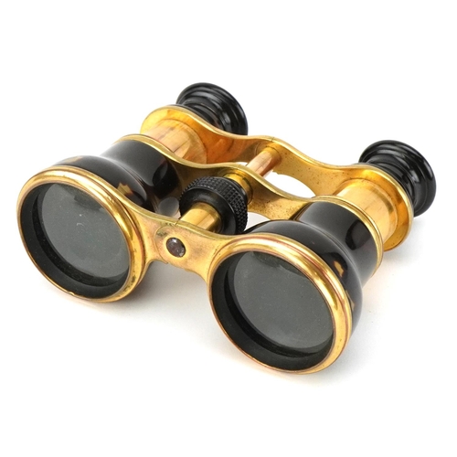 26 - A pair of 20th century gilt brass and tortoiseshell opera glasses by Dollond of London, housed in a ... 