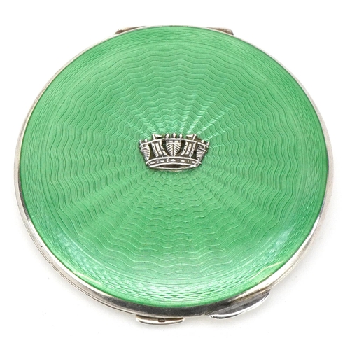 23 - John William Barrett & Sons Ltd., a naval interest silver and green guilloche enamel compact, Birmin... 