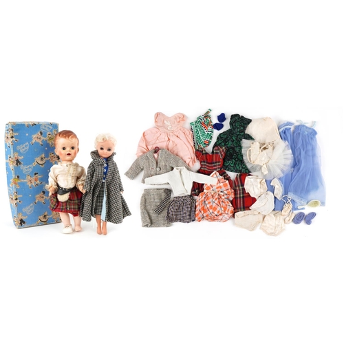 1136 - A vintage Rosebud doll with a collection of clothes and accessories and a vintage Pedigree doll, the... 