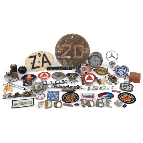 1395 - A large collection of vintage automobilia including car badges, Caravan Club, Institute of Advanced ... 