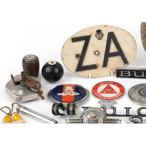 1395 - A large collection of vintage automobilia including car badges, Caravan Club, Institute of Advanced ... 