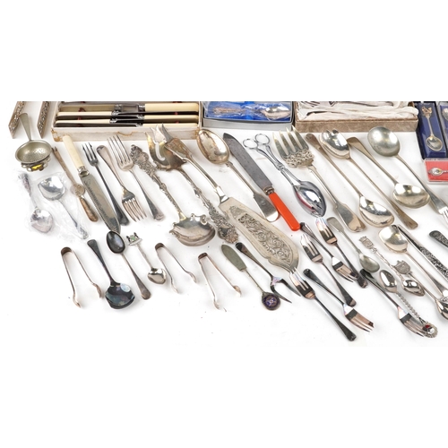 2615 - A large collection of vintage and later silver plated and stainless steel cutlery, some in cases, bo... 