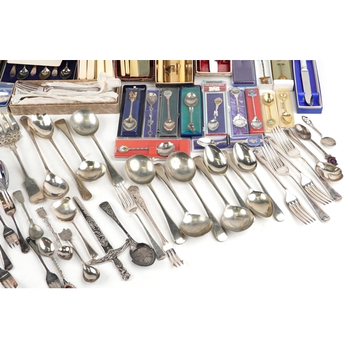 2615 - A large collection of vintage and later silver plated and stainless steel cutlery, some in cases, bo... 