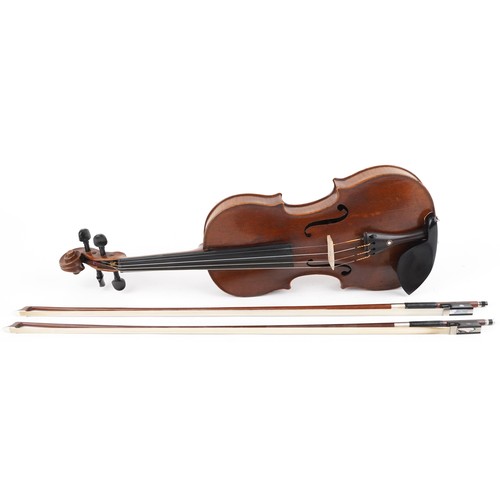 An early 19th century French violin with one piece back bearing label to interior, the back 36cm in length excluding the button, with a German bow, 73.5cm in length, and a modern bow 73cm in length and a hard case.