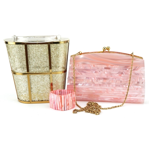 1169 - A vintage faux pink mother-of-pearl clutch bag, 23cm wide, together with a mottled clear Perspex and... 