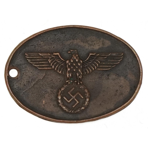 1480 - A World War II German Geheime Staatspolizei 'Gestapo' bronze identification badge, number 977, 5cm w... 