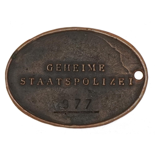 1480 - A World War II German Geheime Staatspolizei 'Gestapo' bronze identification badge, number 977, 5cm w... 