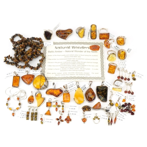 3725 - A large collection of silver mounted amber jewellery, predominantly with Natural Wonders tags, inclu... 