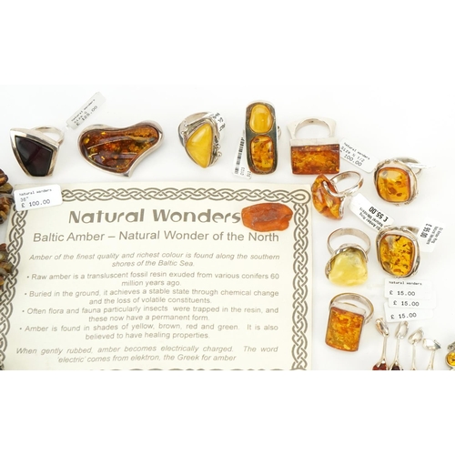 3725 - A large collection of silver mounted amber jewellery, predominantly with Natural Wonders tags, inclu... 