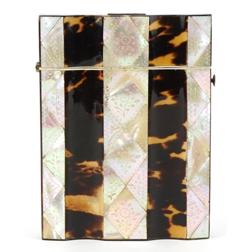 29 - An early 20th century tortoiseshell and mother of pearl card case engraved with flowers, 10cm x 7.5c... 