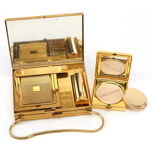 1167 - A vintage Estée Lauder jewelled American Beauty 2002 compact with box and a gilt metal travel compac... 