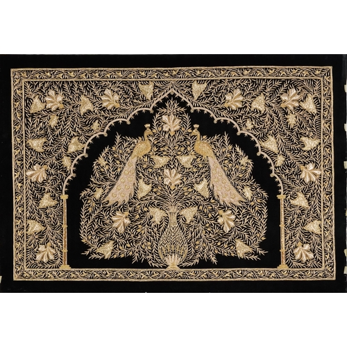 480 - A good Indian gilt thread embroidered black velvet panel, 20th century, decorated with two peacocks ... 