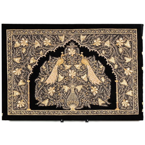 480 - A good Indian gilt thread embroidered black velvet panel, 20th century, decorated with two peacocks ... 