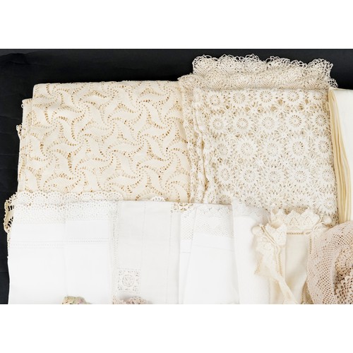 1176 - A mixed group of 20th century lace and white work including table cloths and mats. the largest is 27... 