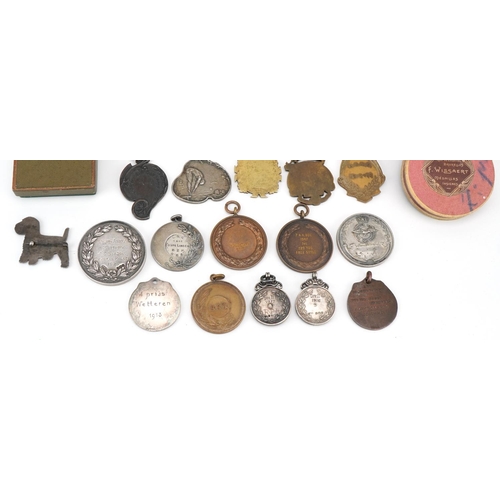 1400 - A group of early 20th century Belgian bronze, silver and gilt metal presentation medallions, predomi... 