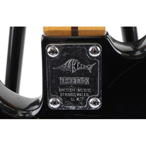 A Marlin Sidewinder electric four string bass guitar finished in black ...