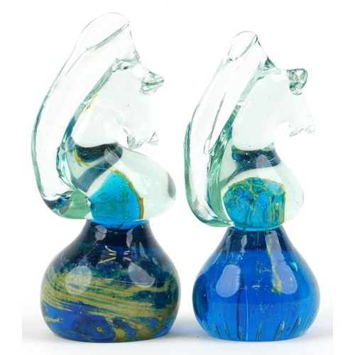 1587 - Two Mdina art glass paperweights in the form of seahorses, signed to base, 14cm high.