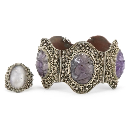 377A - A Chinese export silver filigree and amethyst bracelet, 20th century, inset with five carved stones,... 