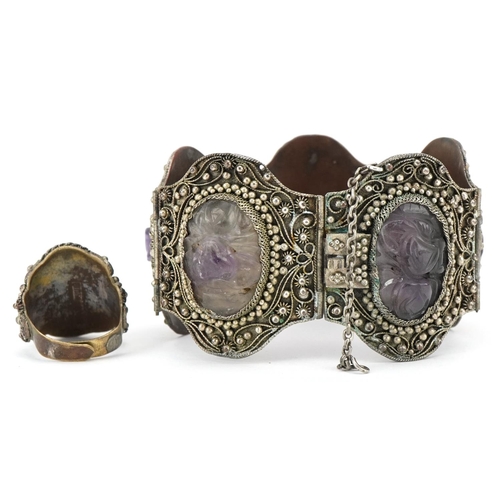 377A - A Chinese export silver filigree and amethyst bracelet, 20th century, inset with five carved stones,... 