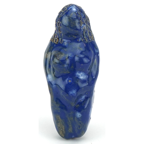 445 - An unusual Egyptianesque blue glazed ceramic figurine, mid 20th century, 9cm in length.