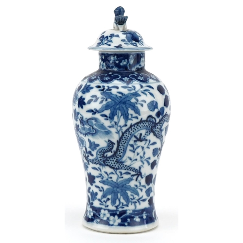 429 - A Chinese blue and white porcelain vase and cover, 19th century, decorated with dragons amongst foli... 