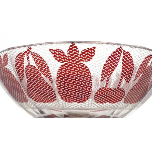 2553 - An Art Deco Bohemian flash overlaid glass footed bowl decorated with pineapple, pears and cherries, ... 