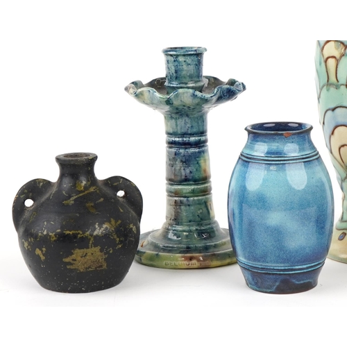 2558 - A small group of mixed pottery items including three vases, two handled jug, candlestick and two egg... 