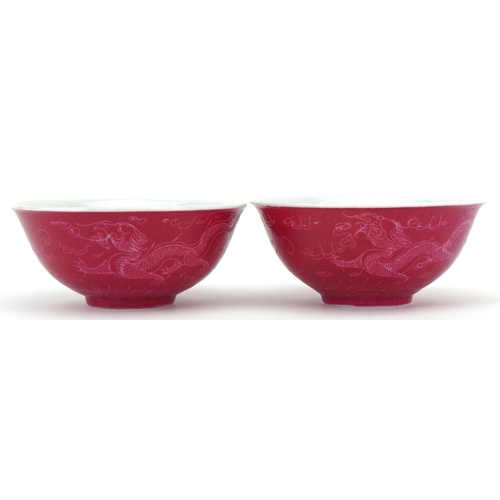 490 - A pair of Chinese porcelain finger bowls, 20th century, each decorated with a continuous band of dra... 