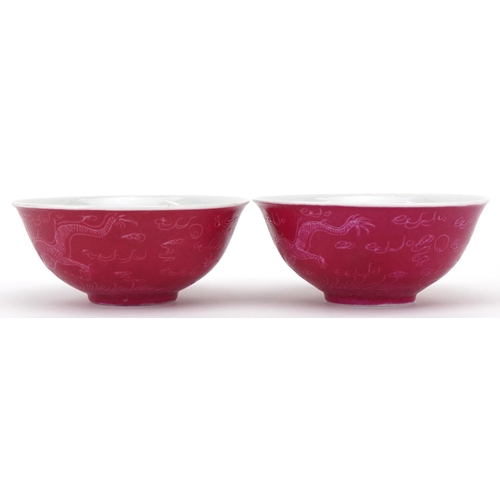 490 - A pair of Chinese porcelain finger bowls, 20th century, each decorated with a continuous band of dra... 