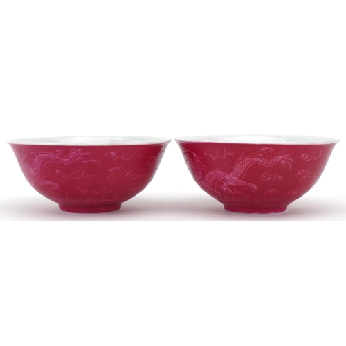 490 - A pair of Chinese porcelain finger bowls, 20th century, each decorated with a continuous band of dra... 